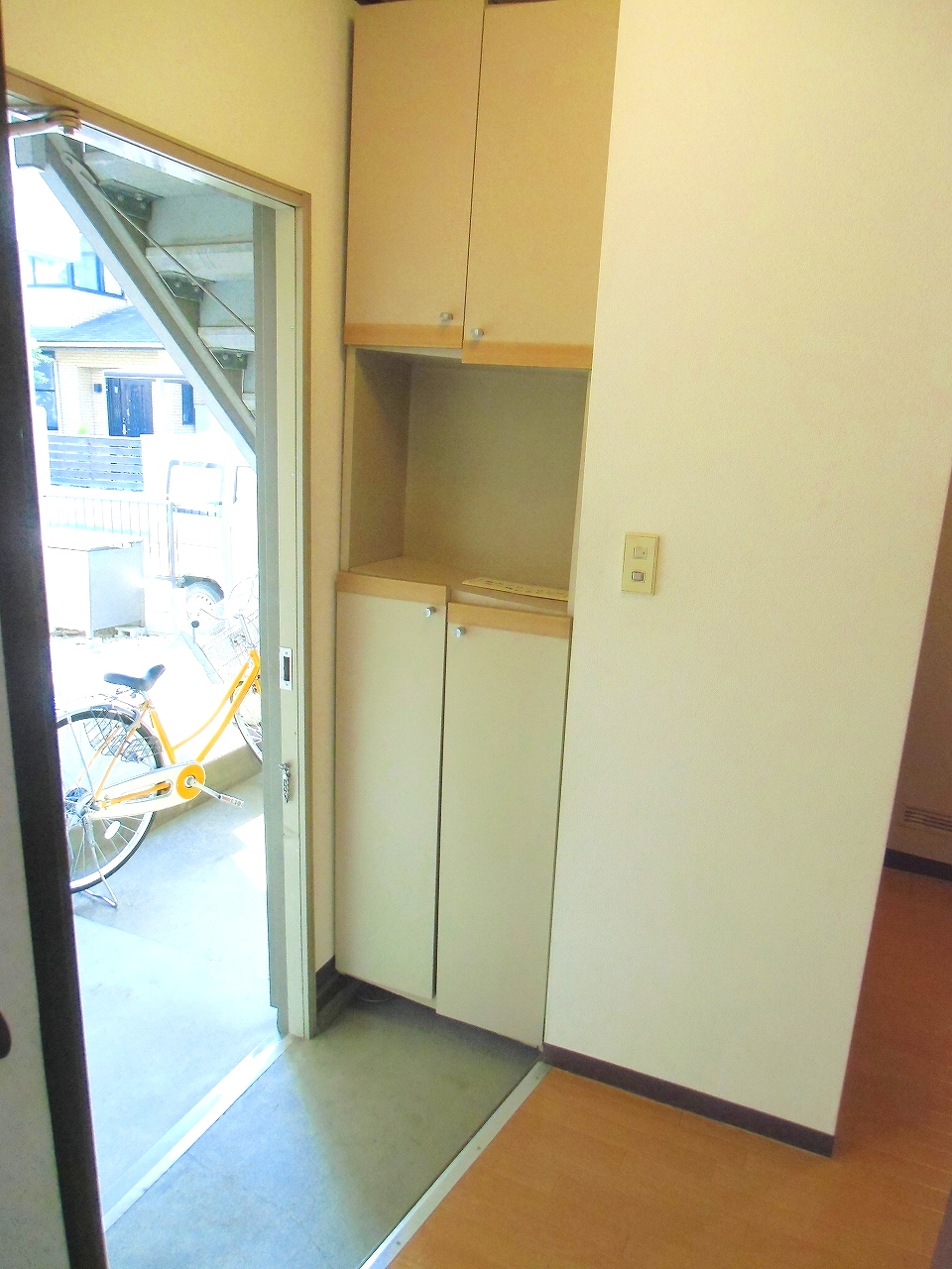 Entrance. It is the entrance with a shoebox