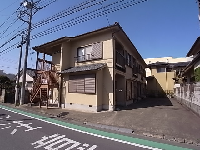 Building appearance. Day is good. Veranda side parking