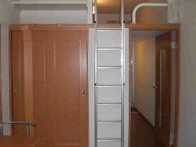 Living and room. There are also storage space on top of the closet.