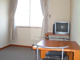 Living and room. Table has become a collapsible. 