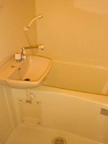 Bath. It is the bathroom, which with a washbasin and a ventilation fan. 