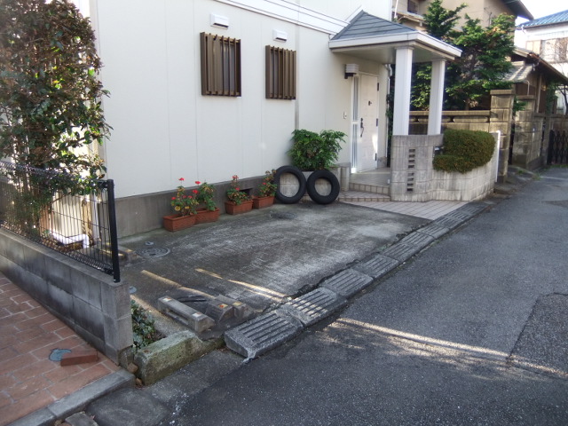 Parking lot. There is parking space for one car