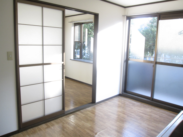 Living and room. Since the corner room with a bay window is bright