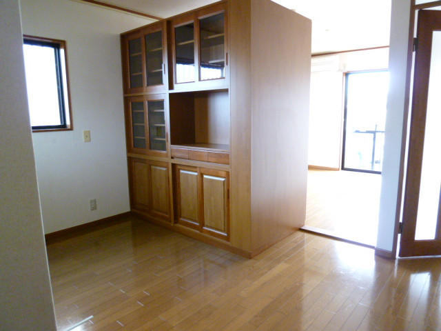 Living and room. Also it has a cupboard in the dining.