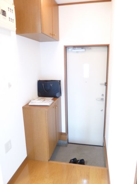 Entrance. Large cupboard with. There is also the top