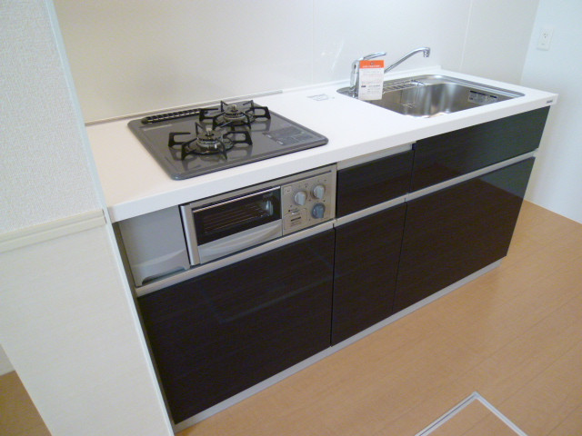 Kitchen. Also it has a fish grill in the kitchen.