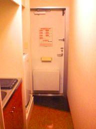 Entrance. It is the entrance with a delivery box.