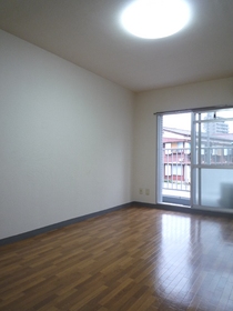 Living and room. There is a balcony