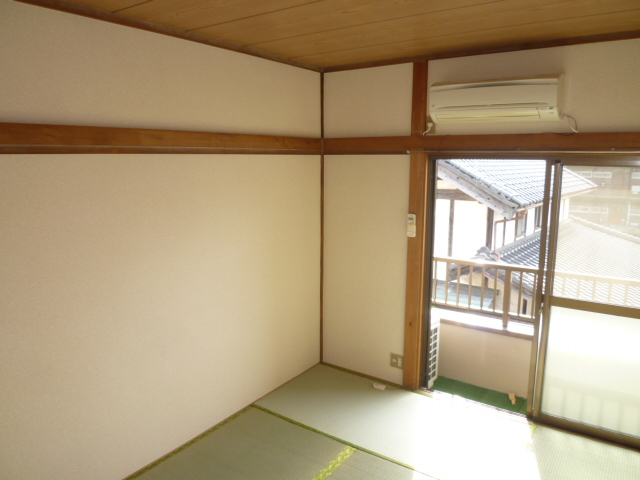 Living and room. Is the image of the other room.