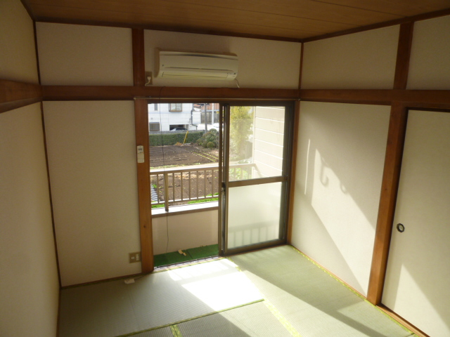 Living and room. Is the image of the other room.