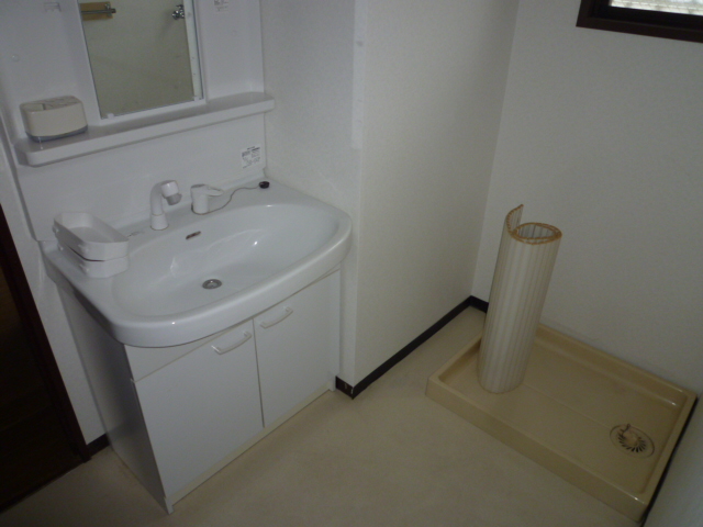 Washroom. It is a photograph of another room