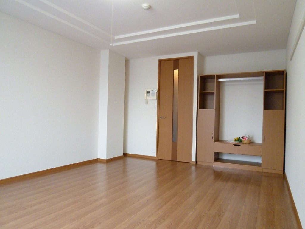 Living and room. Is another room of the same properties