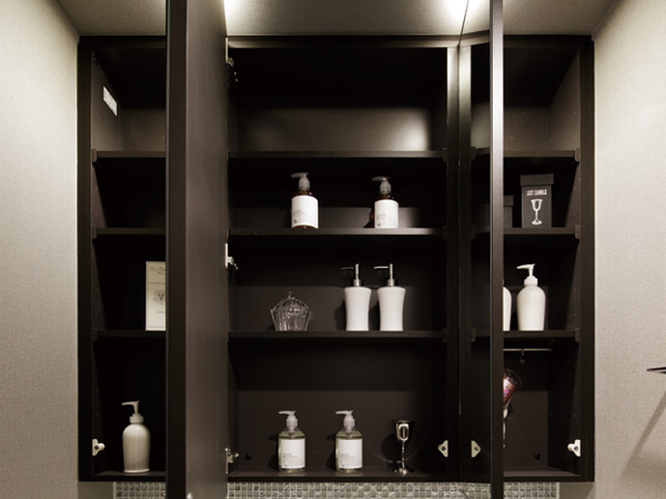 Bathing-wash room.  [Three-sided mirror back storage] Three-sided mirror back storage which can also tidy up those little things, such as dryer hook.