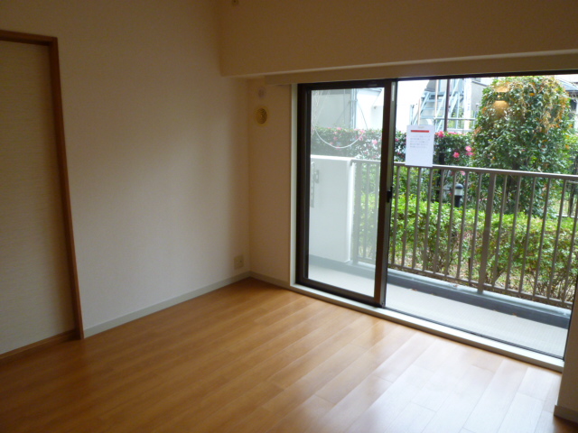 Living and room. It is a photograph of another room.