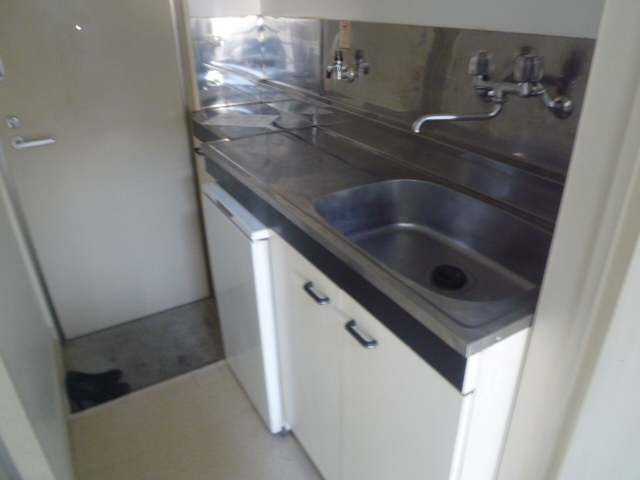 Kitchen. It is another room of the same type