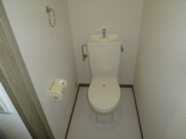 Toilet. Same property, Is another of the room.