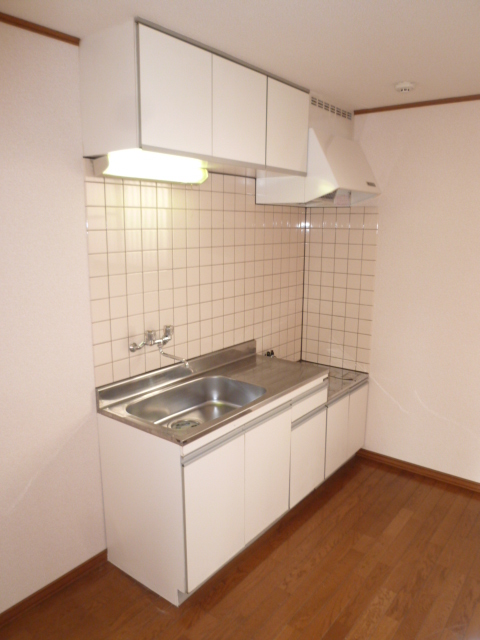 Kitchen. Same property, It is a photograph of another room