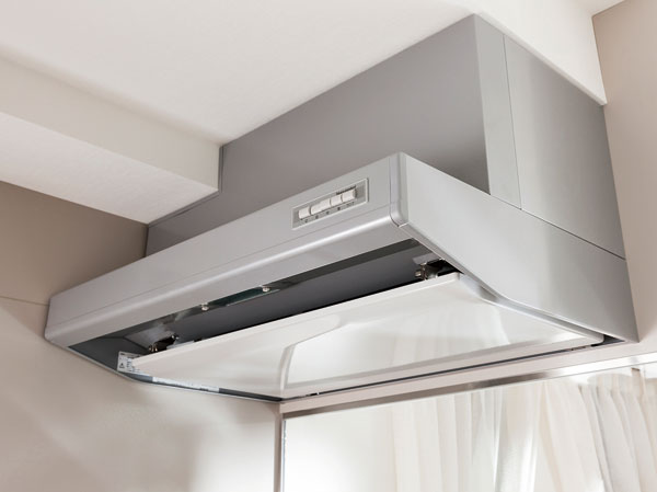 Kitchen.  [Current plate with a range hood] High suction force with the current plate, Care also smooth.