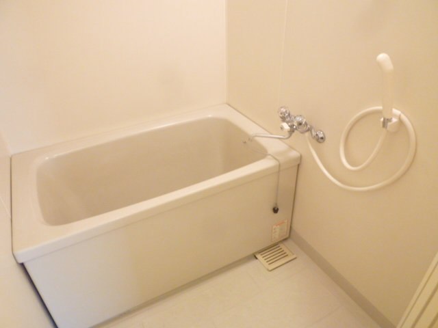 Bath. Same property, It is a photograph of another room