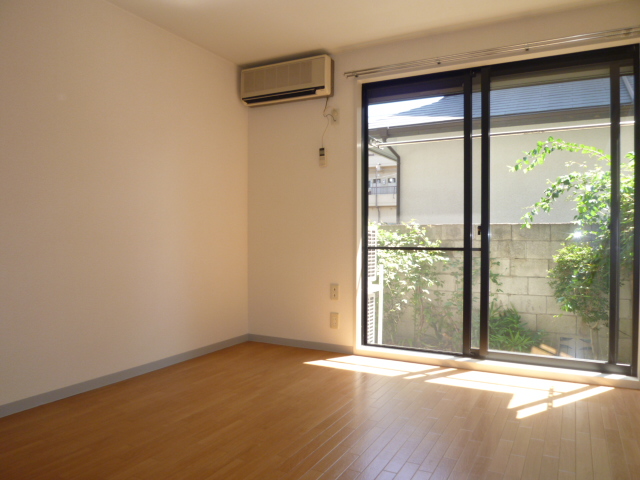 Living and room. It is a photograph of another room