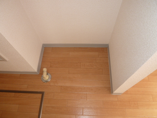 Other Equipment. Laundry Area (It is a photograph of another room)