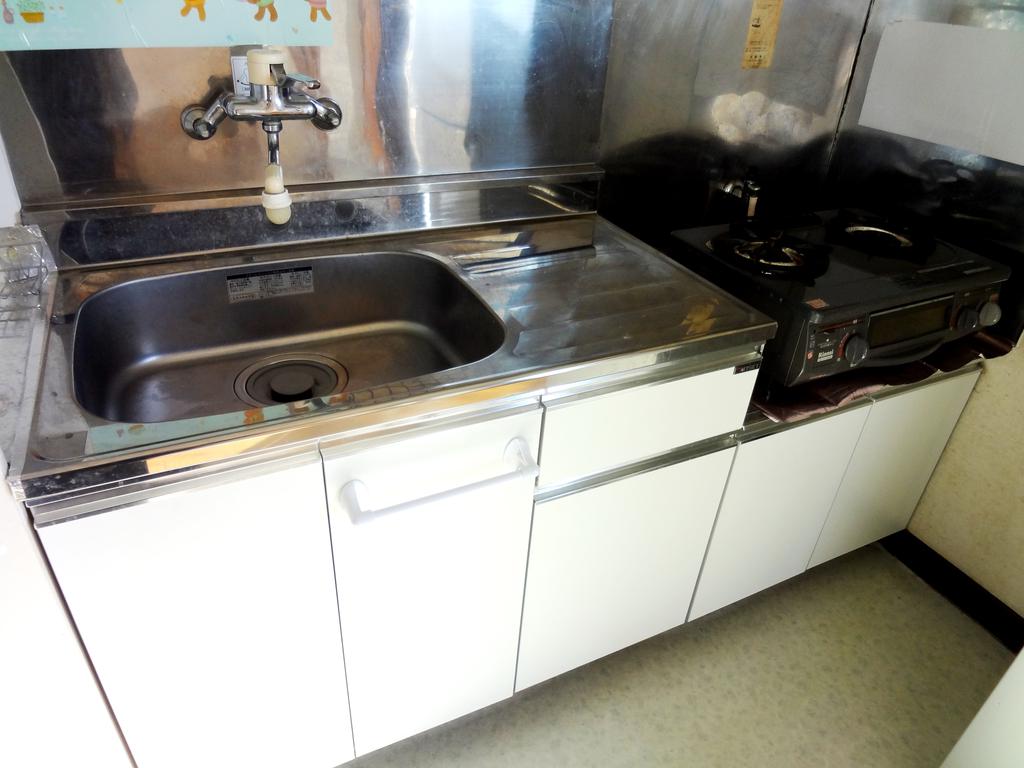 Kitchen. It is recommended for those favorite dishes because it is separate from the living room