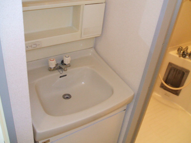 Washroom. It is a photograph of another room of the same type