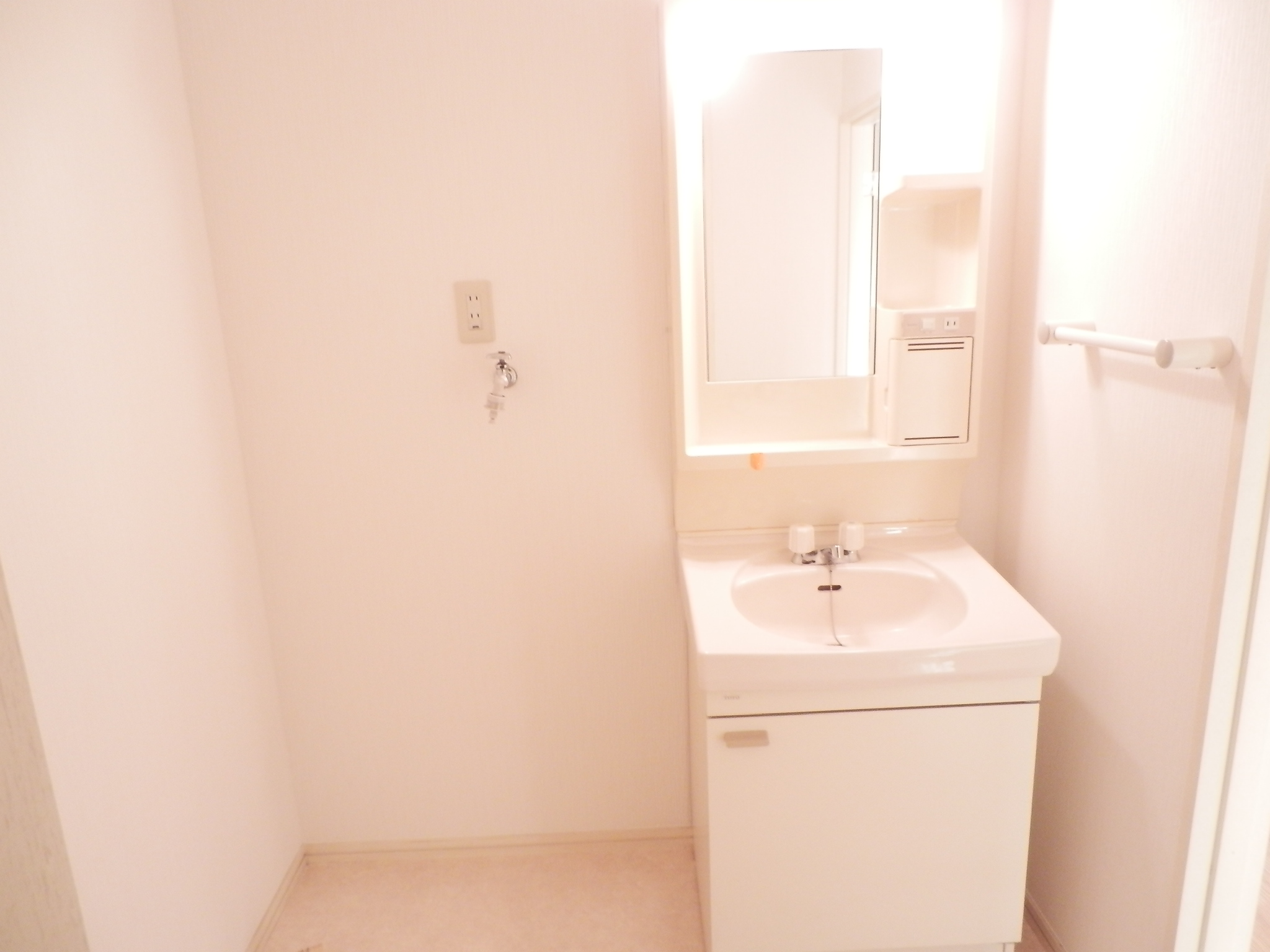 Washroom. Washing machine in the room