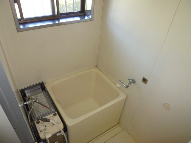 Bath. Same property, It is a photograph of a different type of room