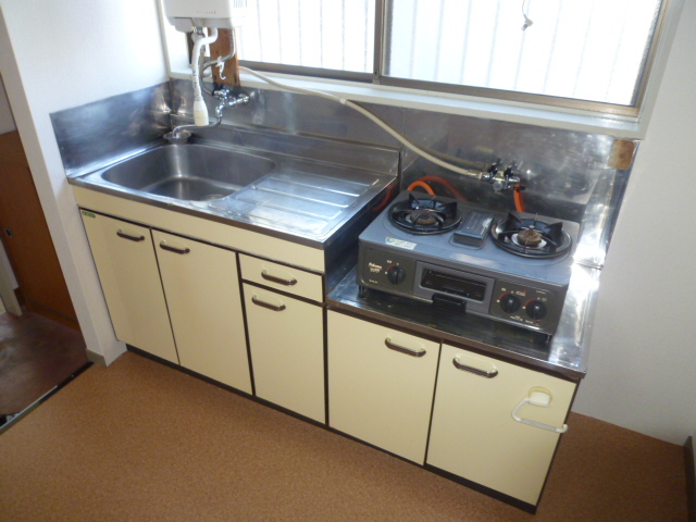 Kitchen. Same property, It is a photograph of a different type of room