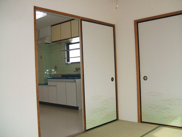 Living and room. It is a photograph of another room of the same type