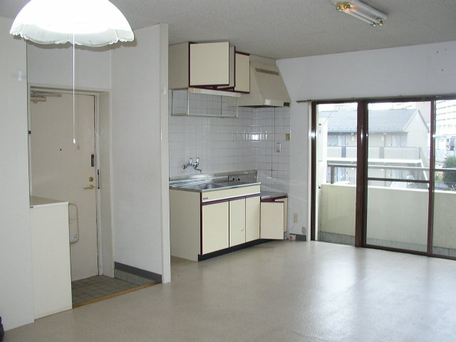 Living and room. It is a photograph of another room