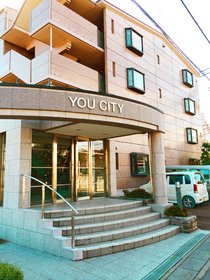 Building appearance. Entrance is a side