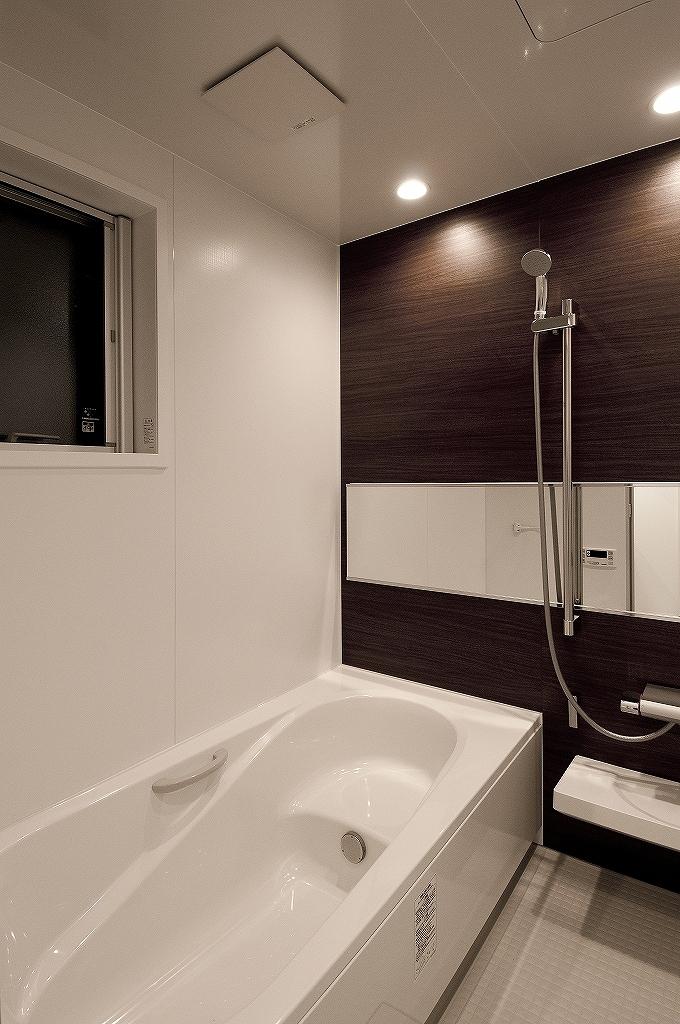 Bathroom. Eco-full shower, Wide mirror, Thermo Floor, LED lamps, such as grade UP specification. Beautiful bathroom is the contrast of white and brown.