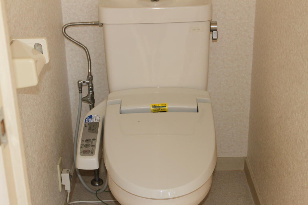 Toilet. Washlet is with