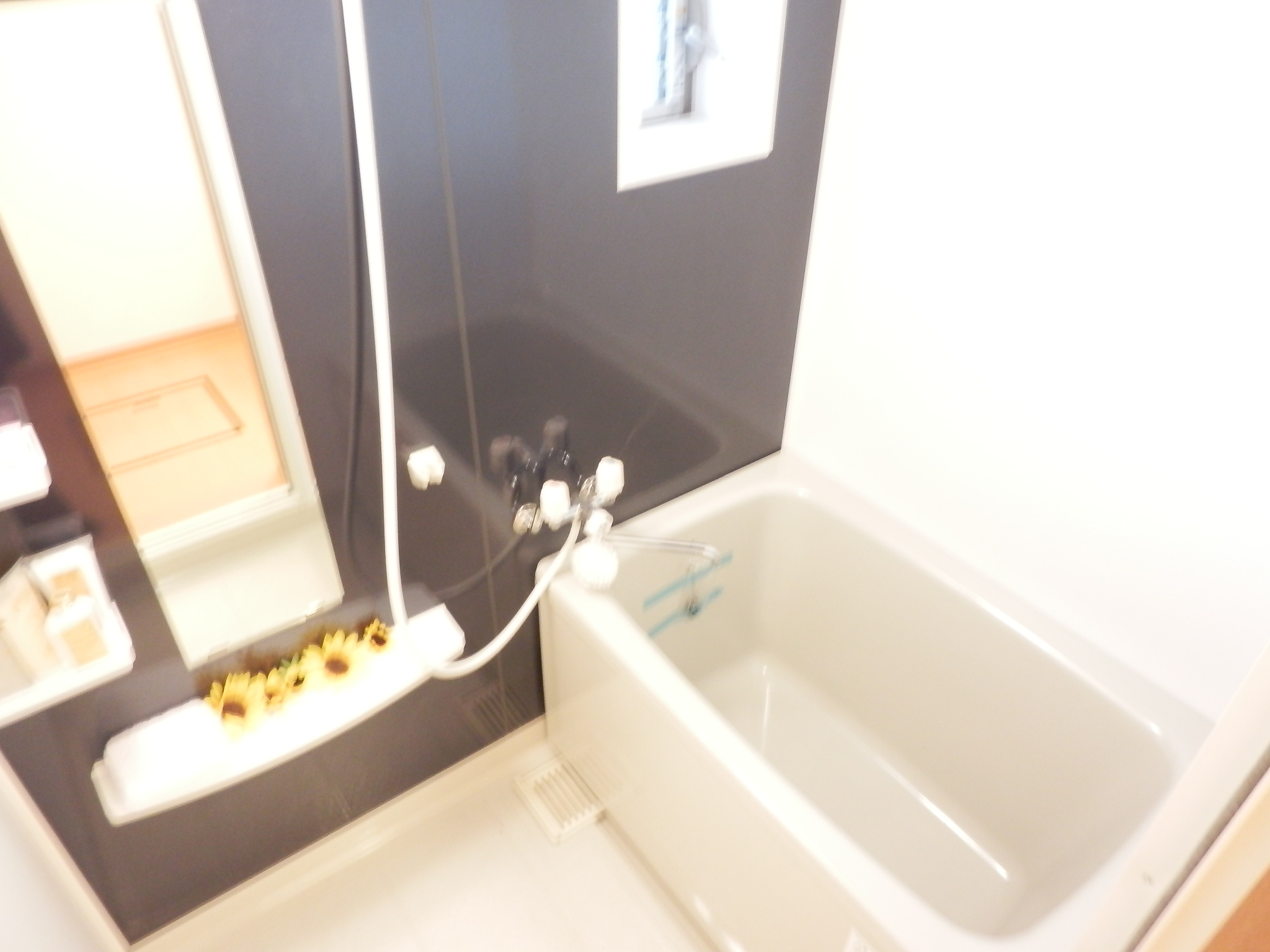 Bath. Luxury panel adopted. It is with a ventilation window. 