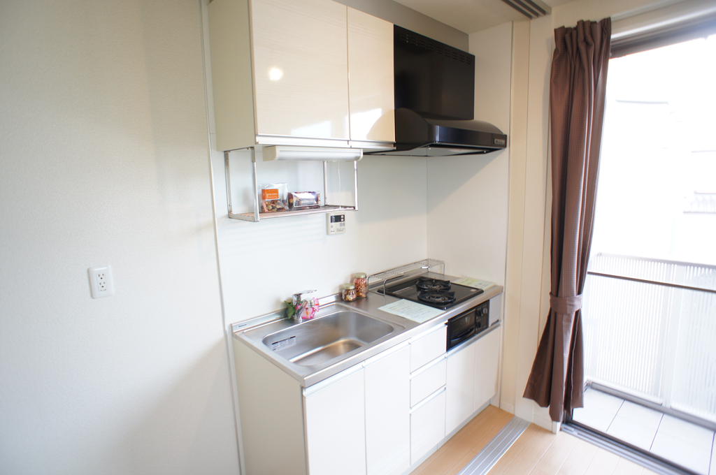 Kitchen. Two-burner stove ・ This is a system kitchen with grill