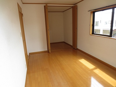 Living and room. Back is the walk-in closet!