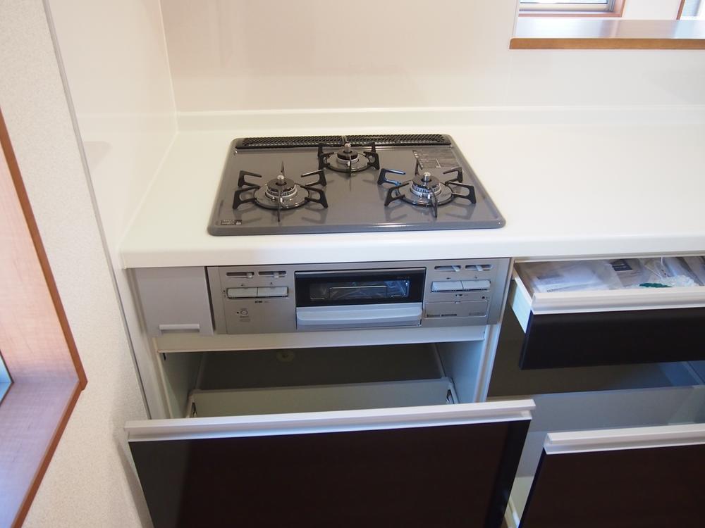 Kitchen. It is a gas stove.