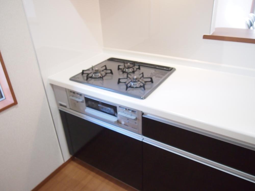 Kitchen. It is a gas stove. 