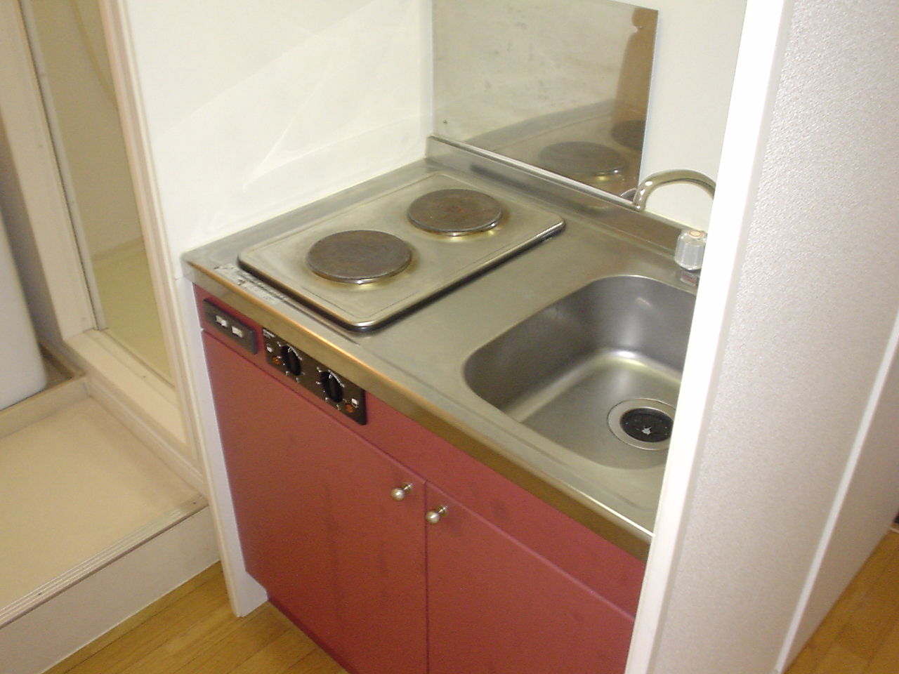 Kitchen. Two-burner stove is in the kitchen.