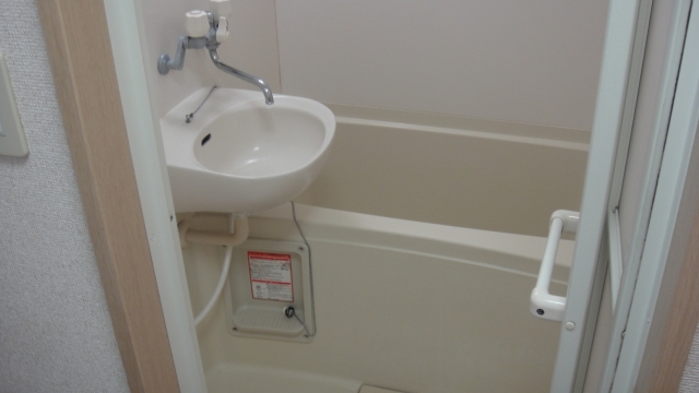 Bath. It is a bathroom with a shower.