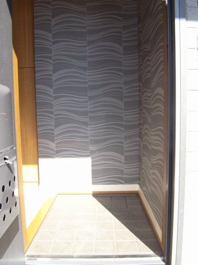 Entrance. Shoe box storage with