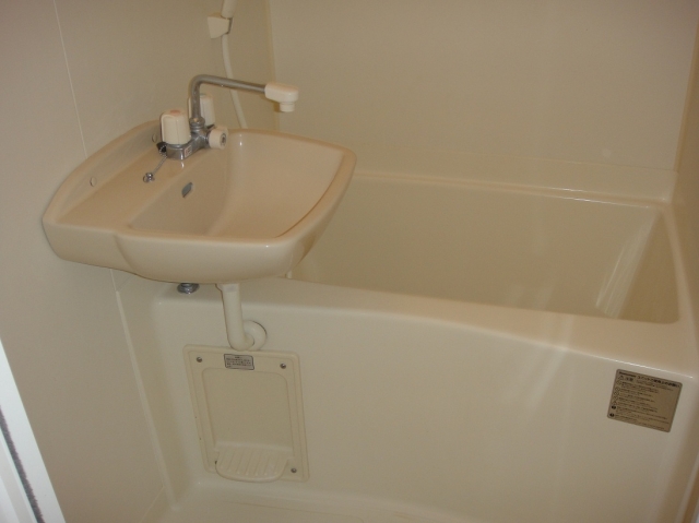 Bath. It is a bathroom with a shower. With bathroom ventilation dryer.