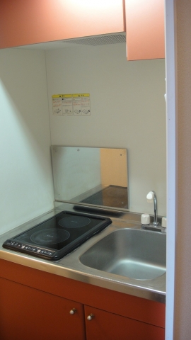 Kitchen. Two-burner stove is in the kitchen. 