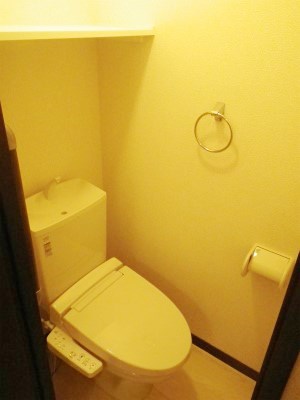 Toilet. It is also convenient with shelves and towel warm water washing toilet seat!