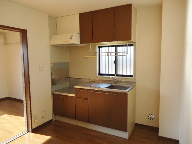 Kitchen. Ventilation is good at with a window. Two-burner stove can be installed