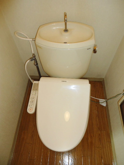 Toilet. Toilet (with warm water cleaning toilet seat)