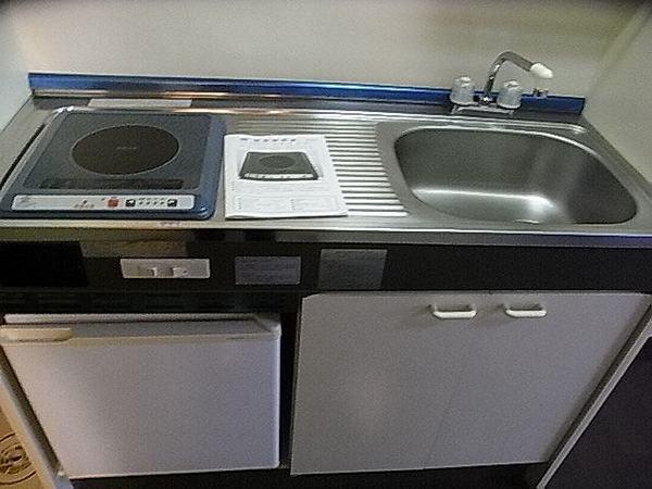 Kitchen. Also equipped with a mini fridge