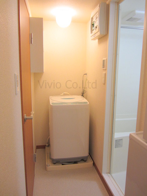 Other. Washing machine in the room.